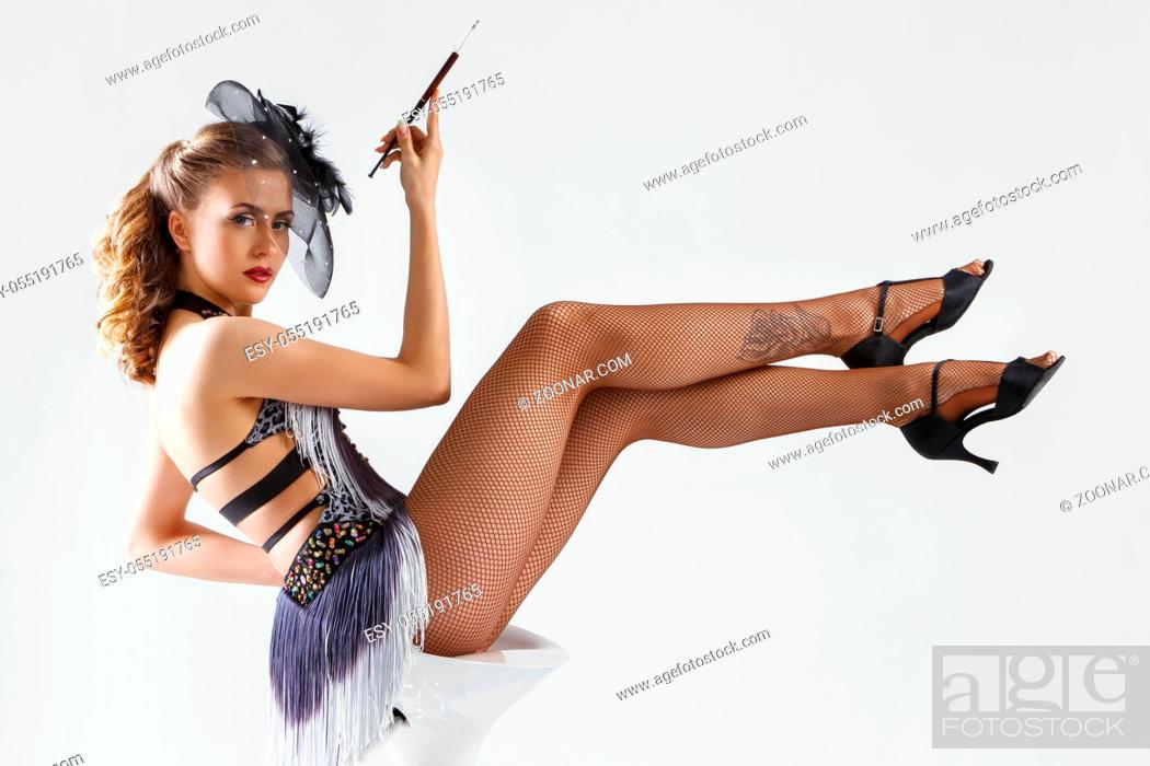 Stock Photo: Burlesque. Cute, beautiful woman on a white background.