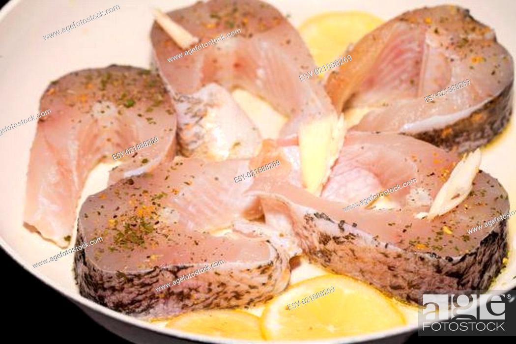 Stock Photo: The fried fish on the frying pan.