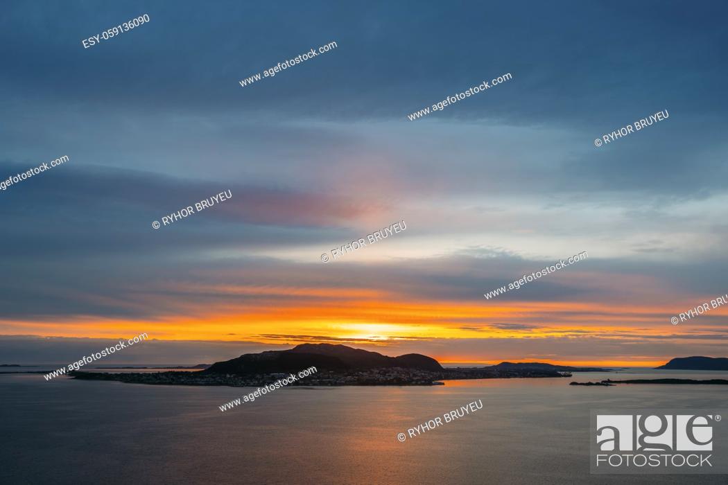 Stock Photo: Alesund, Norway. Amazing Natural Bright Dramatic Sky Above Alesund Valderoya And Islands In Sunset Time. Colorful Sky Background.