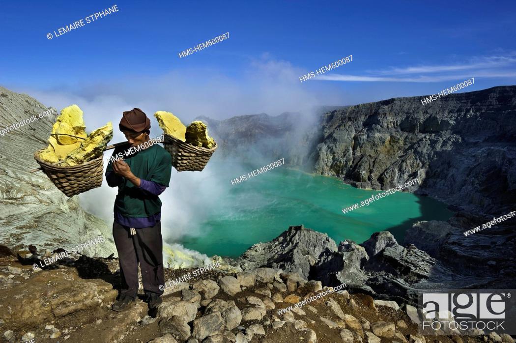 Stock Photo: Indonesia, Java, East Java Province, Mining Sulfur by hand in Kawah Ijen volcano 2500m, the carrier Roknat bringing back 70kg of sufur from the heart of the.