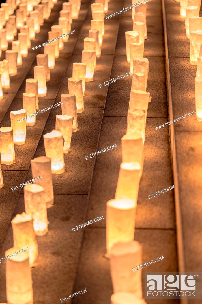 Stock Photo: Handmade japanese washi paper lanterns illuminating the stone steps of the Zojoji temple near the Tokyo Tower during Tanabata Day on July 7th.