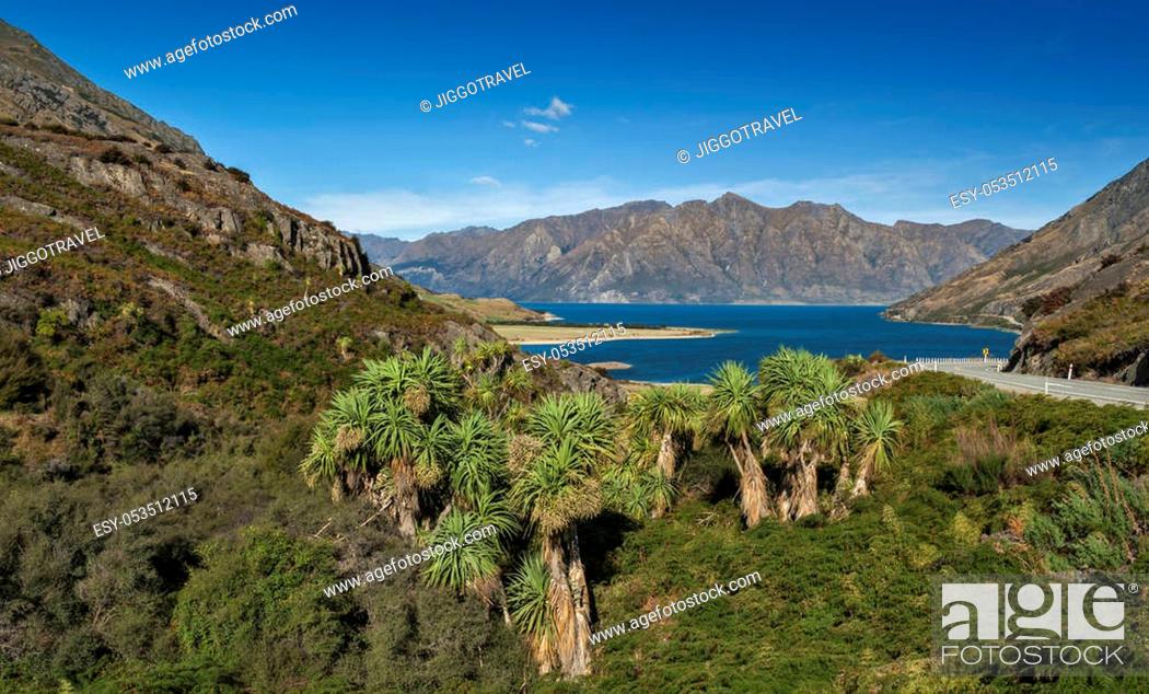 Stock Photo: Viewpoint at a rocky ridge called The Neck stands between Lake Wanaka and Lake Hawea at their closest point on the Makarora Lake Hawea road, New Zealand.