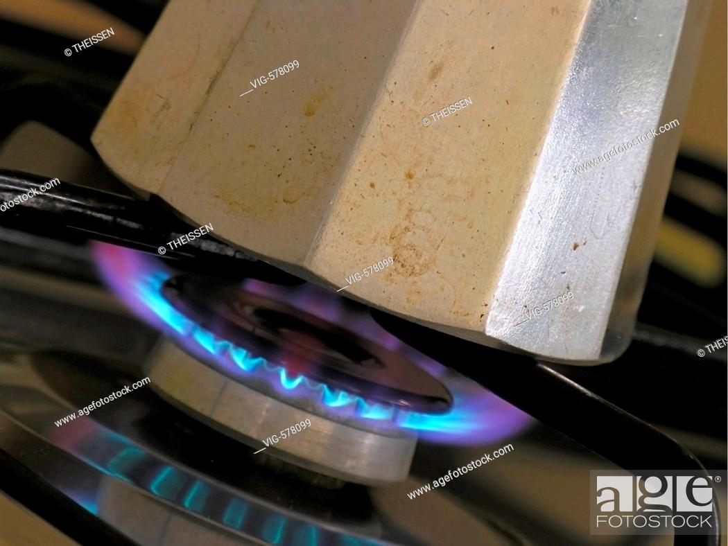 Stock Photo: traditional aluminium espresso cooker on gas flame. - 30/03/2005.