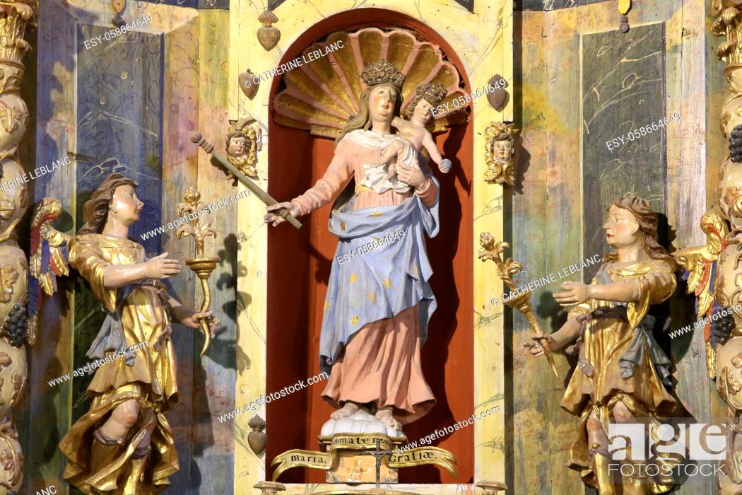 Photo de stock: The Virgin of the Assumption, St. Bernard of Clairvaux and St. Antoine. Sculptures. Altarpiece, (work of Jacques Clairant).
