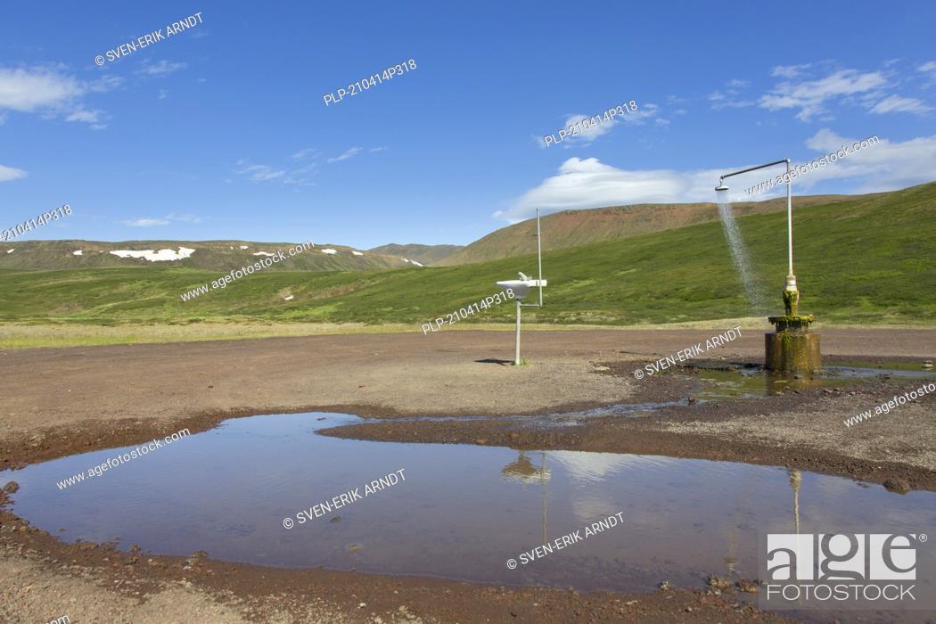 Stock Photo: Shower and sink with hot water at Krafla, volcanic caldera in the Myvatn Geothermal Area in summer, North Iceland.
