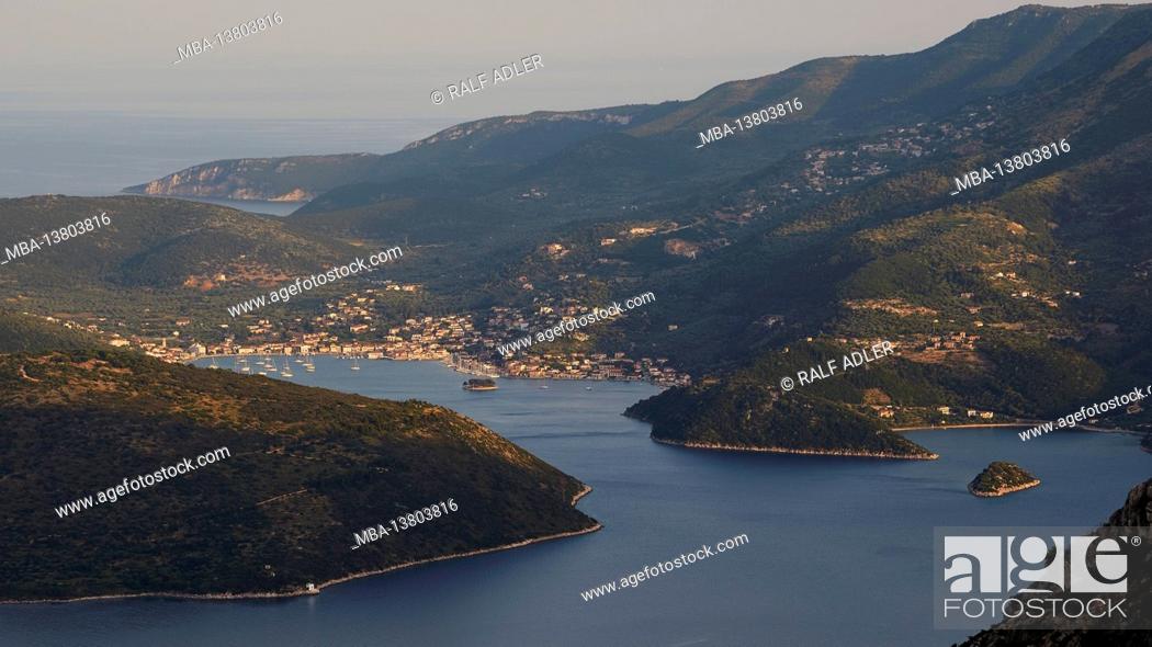 Stock Photo: Ionian Islands, Ithaka, island of Odysseus, capital, Vathi, view from above on the bay of Molos and Vathi, offshore islet, bay of Vathi, sea blue.