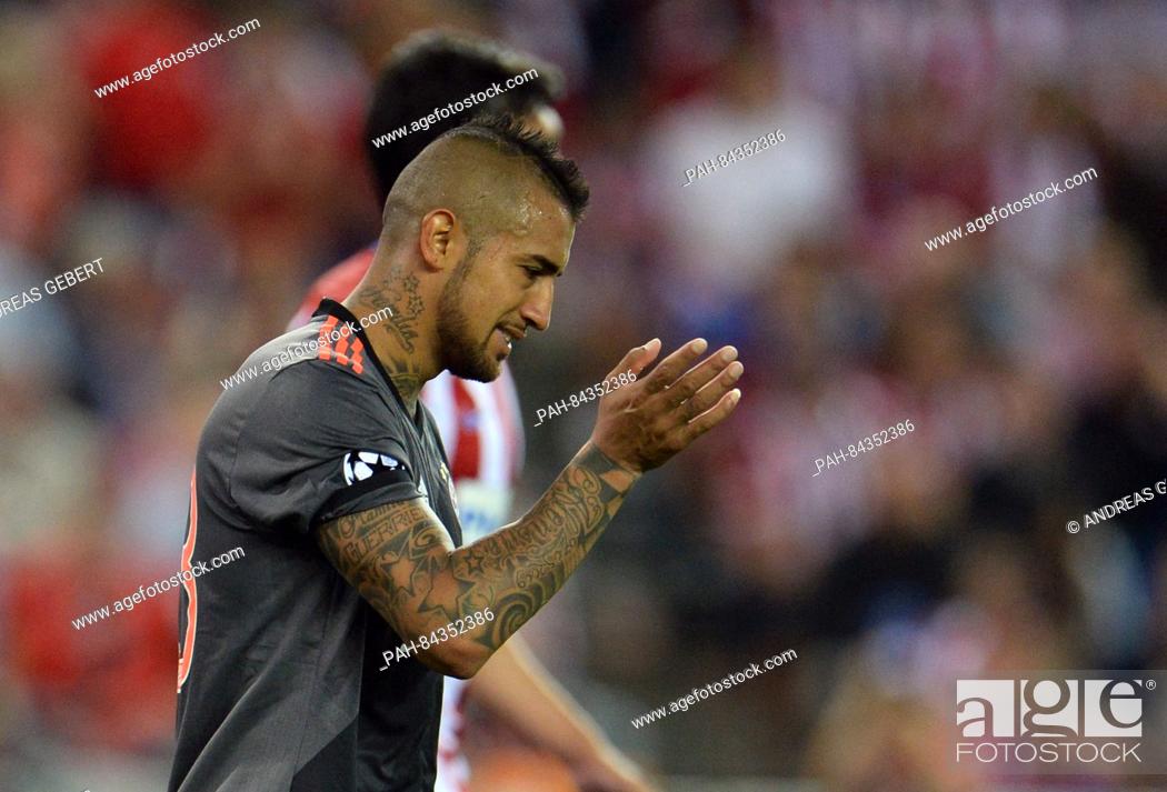 Stock Photo: Munich's Arturo Vidal reacting during the Champions League Group D soccer match between Atletico Madrid and Bayern Munich at the Vicente Calderon stadium in.