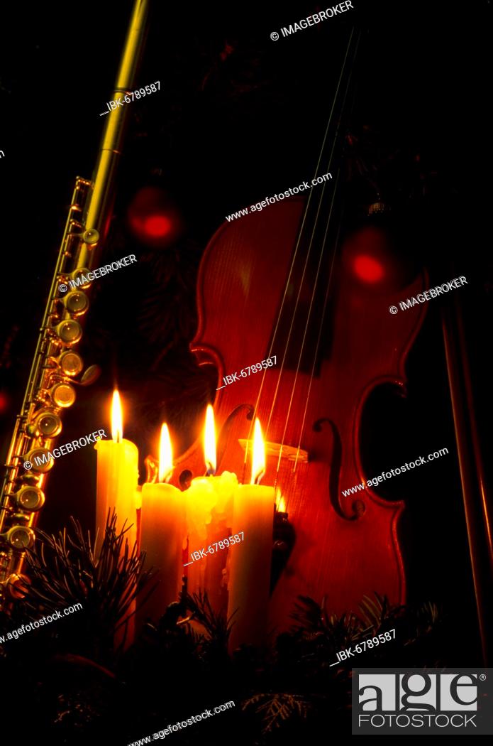 Stock Photo: Burning candles, saxophone, violin.