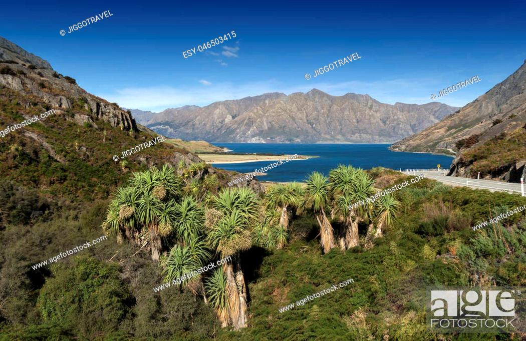 Stock Photo: Viewpoint at a rocky ridge called The Neck stands between Lake Wanaka and Lake Hawea at their closest point on the Makarora Lake Hawea road, New Zealand.