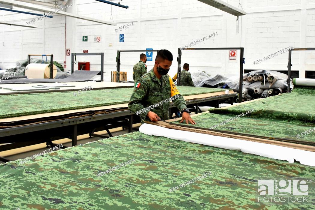 Stock Photo: MEXICO CITY, MEXICO - JUNE 15: Military workers manufacture uniforms for members of the Mexican Army at the Factory of Military Clothing and Equipment founded.