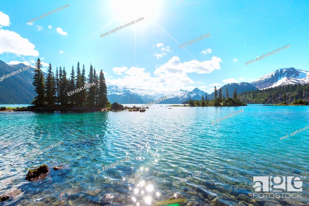 Stock Photo: Hike to turquoise waters of picturesque Garibaldi Lake near Whistler, BC, Canada. Very popular hike destination in British Columbia.