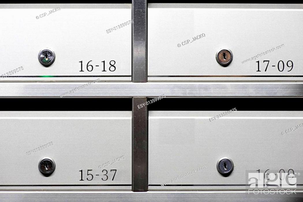 Photo de stock: metallic mailbox array tidy inside apartment houses.