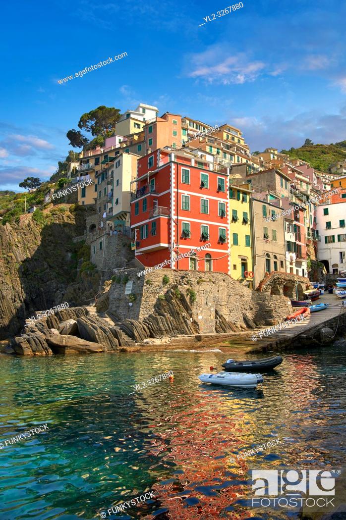 Stock Photo: Fishing village and harbour of Riomaggiore at sunrise, Cinque Terre National Park, Liguria, Italy.