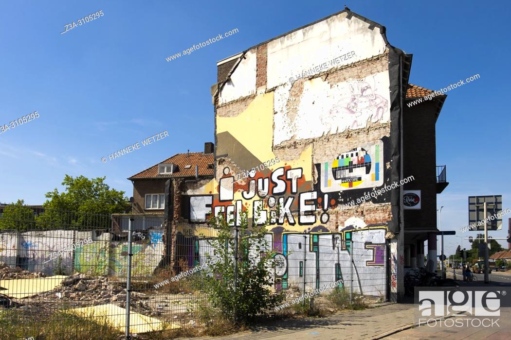 Stock Photo: Graffiti wall with a test screen and a quote 'I just feel like!' in Eindhoven, The Netherlands, Europe.