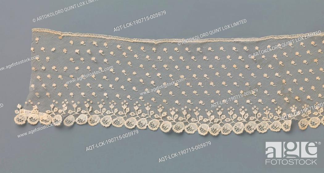 Stock Photo: Strip of application side with a border of oval flowers under a pattern of leaves, Strip of natural-colored Brussels application side: bobbin lace appliqued on.