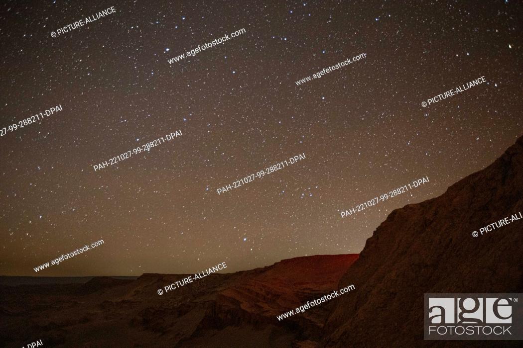 Stock Photo: 27 October 2022, Chile, Atacama: Stars shine over the desert of Atacama. The Atacama Desert is known by a very clear view of the starry sky.