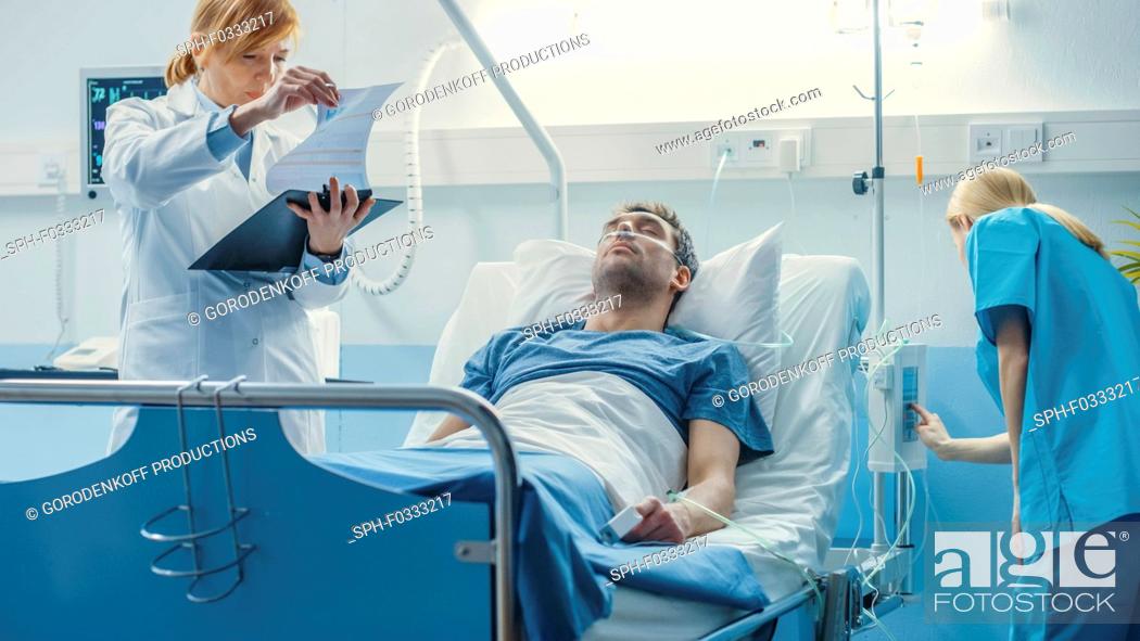 Stock Photo: Patient lying on a hospital bed.