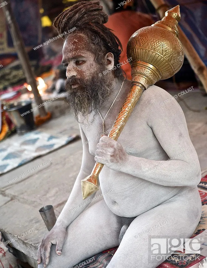 Stock Photo: Hanuman Naga baba, body coated with the ashes of the sacred fire for purification on the ghats in benares, awaiting the shivaratri. UP, india.