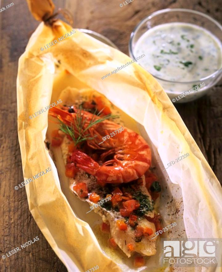 Stock Photo: Whiting fillet with shrimp in paper, yoghurt sauce.