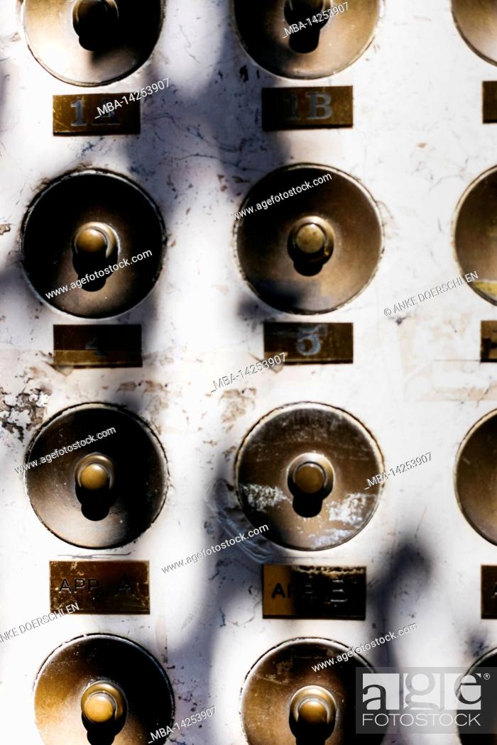 Stock Photo: Old bell buttons on a house wall in the old town of Venice, Italy.