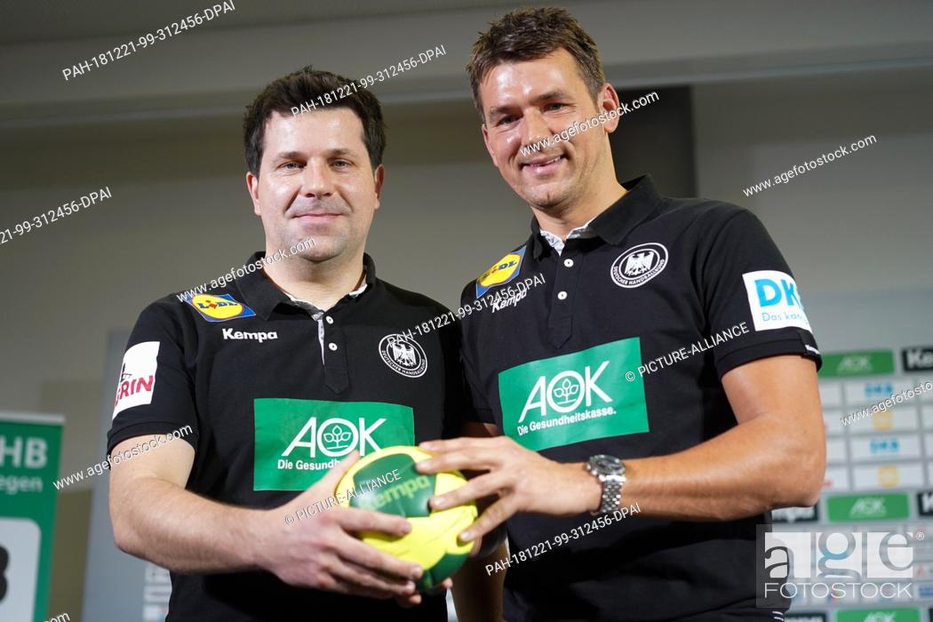 Stock Photo: 21 December 2018, Berlin: Alexander Haase (l), co-trainer, and Christian Prokop, national coach, at a press conference. The World Handball Championship will.