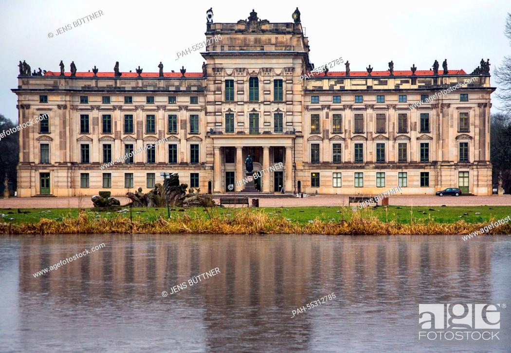 Stock Photo: Schloss Ludwigslust, also know as 'Versailles of the north', mirrors in a puddle in Ludwigslust, Germany, 22 January 2015.