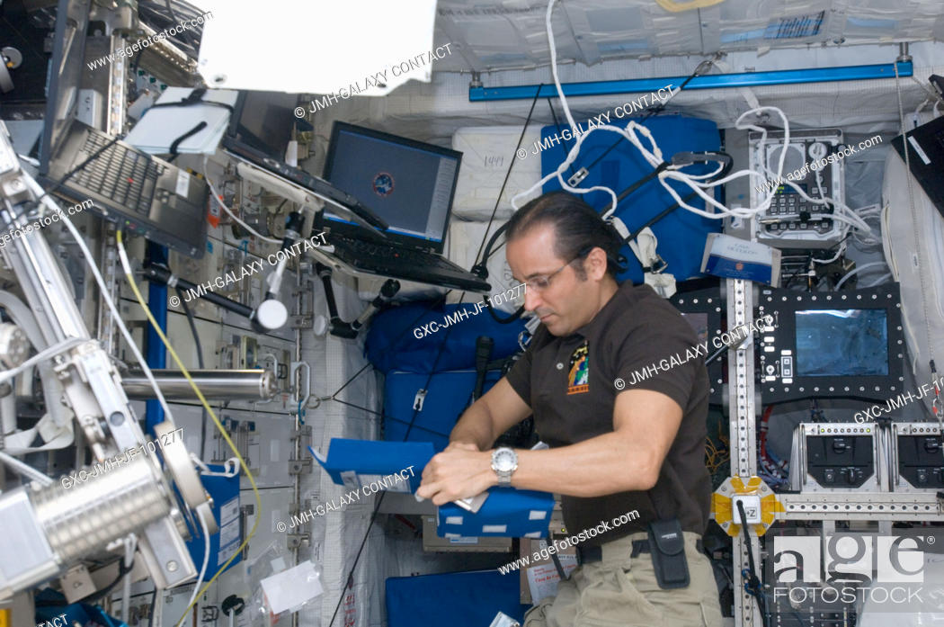 Stock Photo: NASA astronaut Joe Acaba, Expedition 32 flight engineer, works in the Columbus laboratory of the International Space Station.