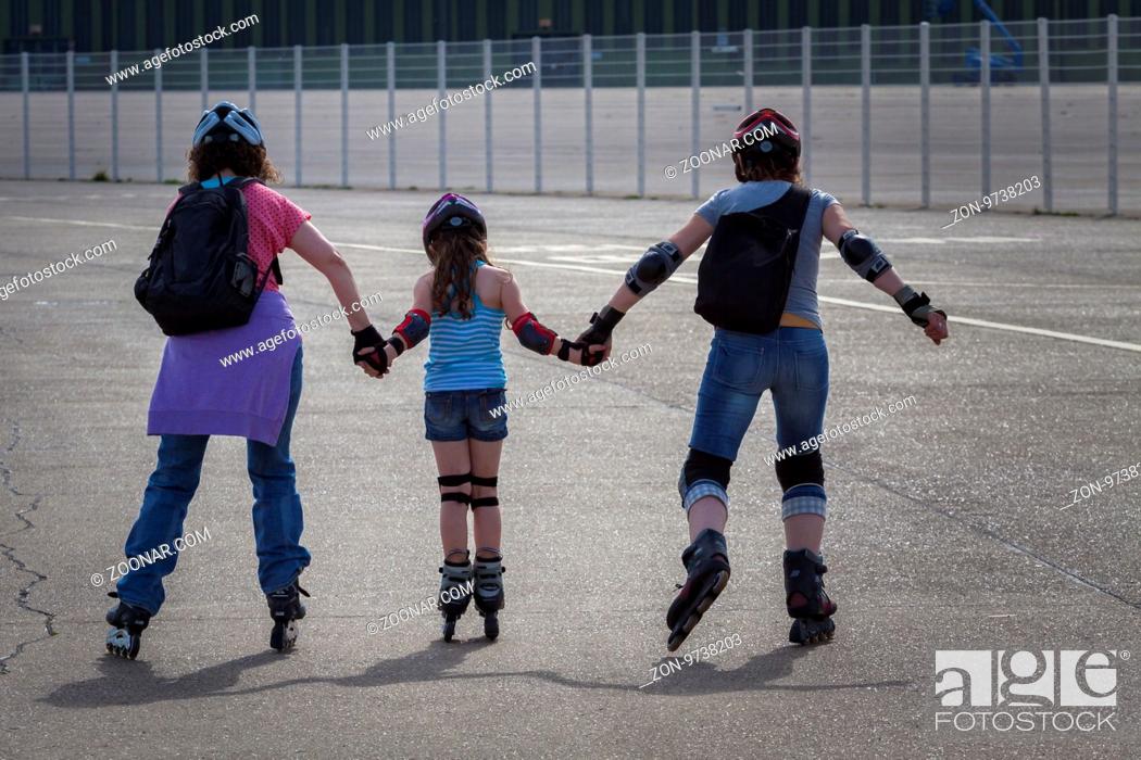 Stock Photo: Leisure, Woman, Emotion, Child, Kid, Girl, Three, Family, Skater, Learning, Help, House, Holding, Clip, Exercise, Support, Block, Athletic, Kind, Asphalt, Excursion, Clinging, Practice, Planing, Handle, Solicitous, Practising, Tempo, Helm, Spare-Time