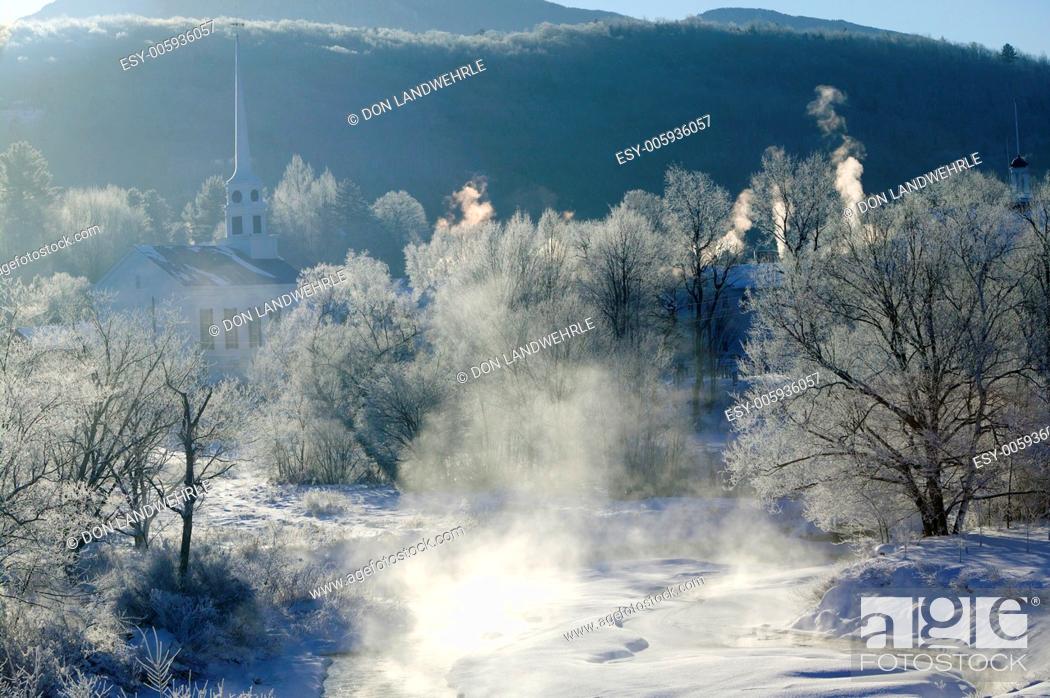 Stock Photo: Sunrise on a cold snow covered morning, Stowe, Vermont, USA.