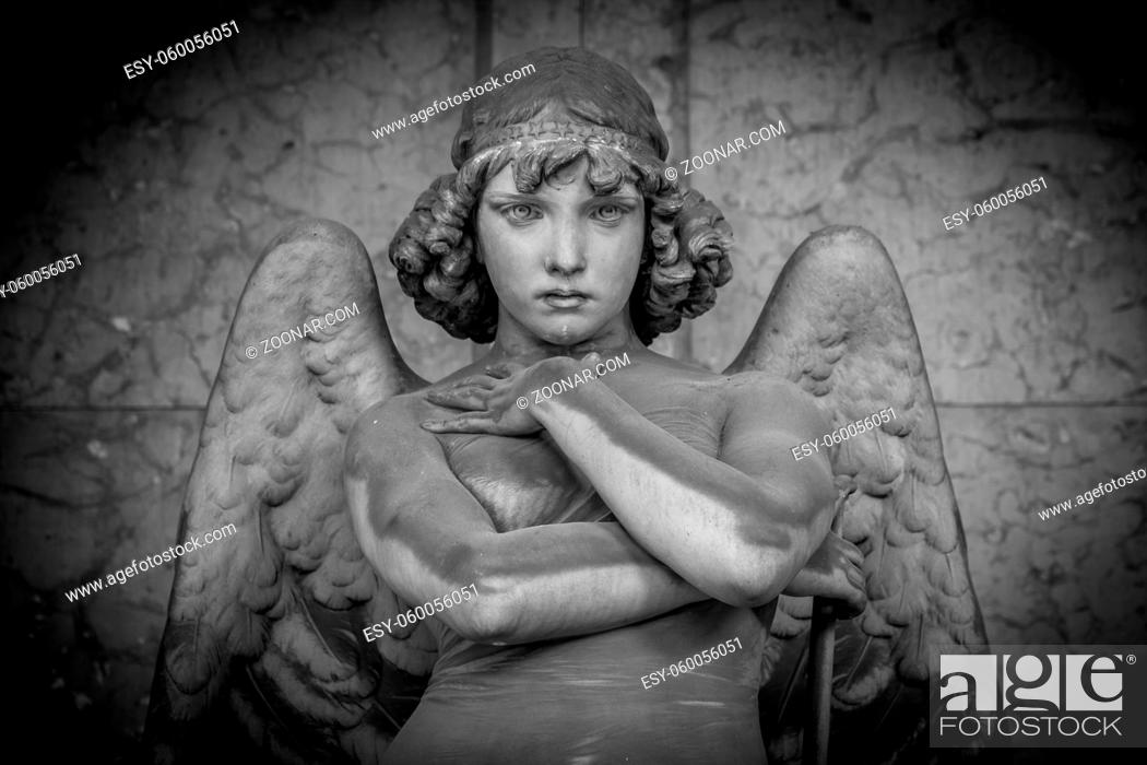 Stock Photo: GENOA, ITALY - CIRCA AUGUST 2020: Angel sculpture by Giulio Monteverde for the Oneto family monument in Staglieno Cemetery, Genoa - Italy (1882).