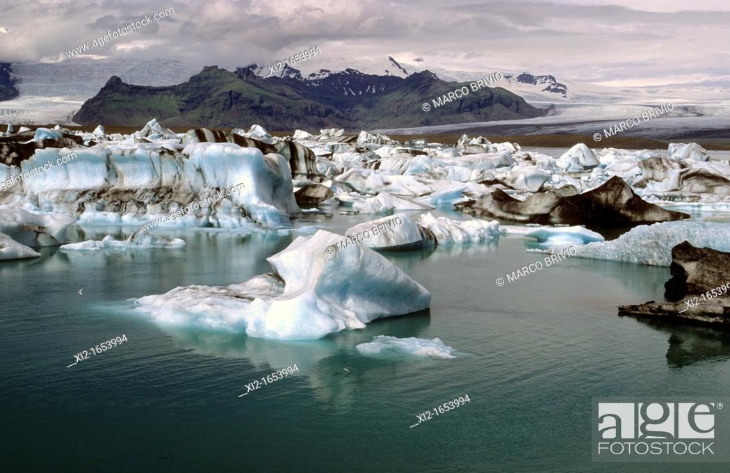 Stock Photo: Iceland  Jökulsárlón is a large glacial lagoon in southeast Iceland, on the borders of Vatnajökull National Park  Situated at the head of Breiðamerkurjökull.