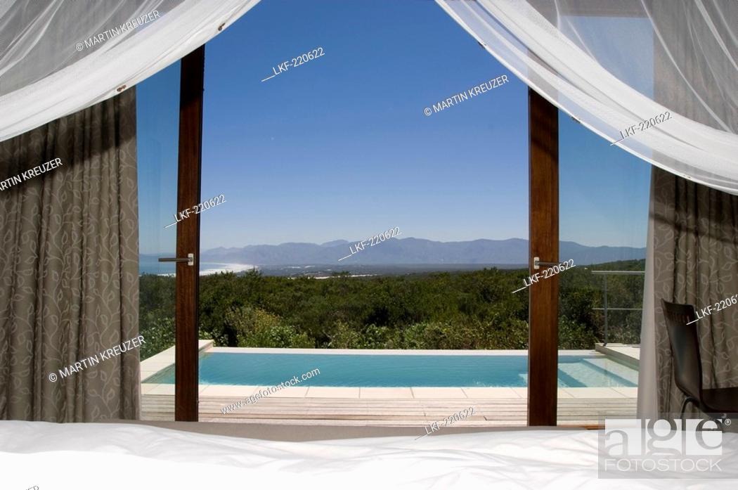 Stock Photo: Suite at the Forest Lodge with view at the pool and Walker Bay, Gansbaai, South Africa, Africa.