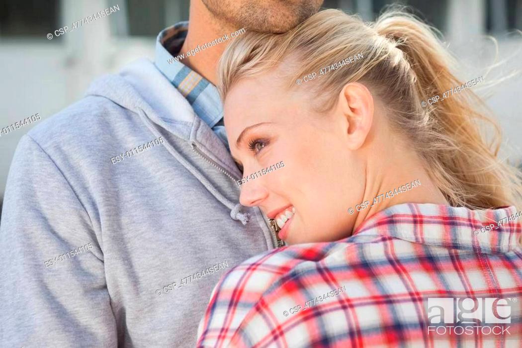 Stock Photo: Hip young couple hugging each other.