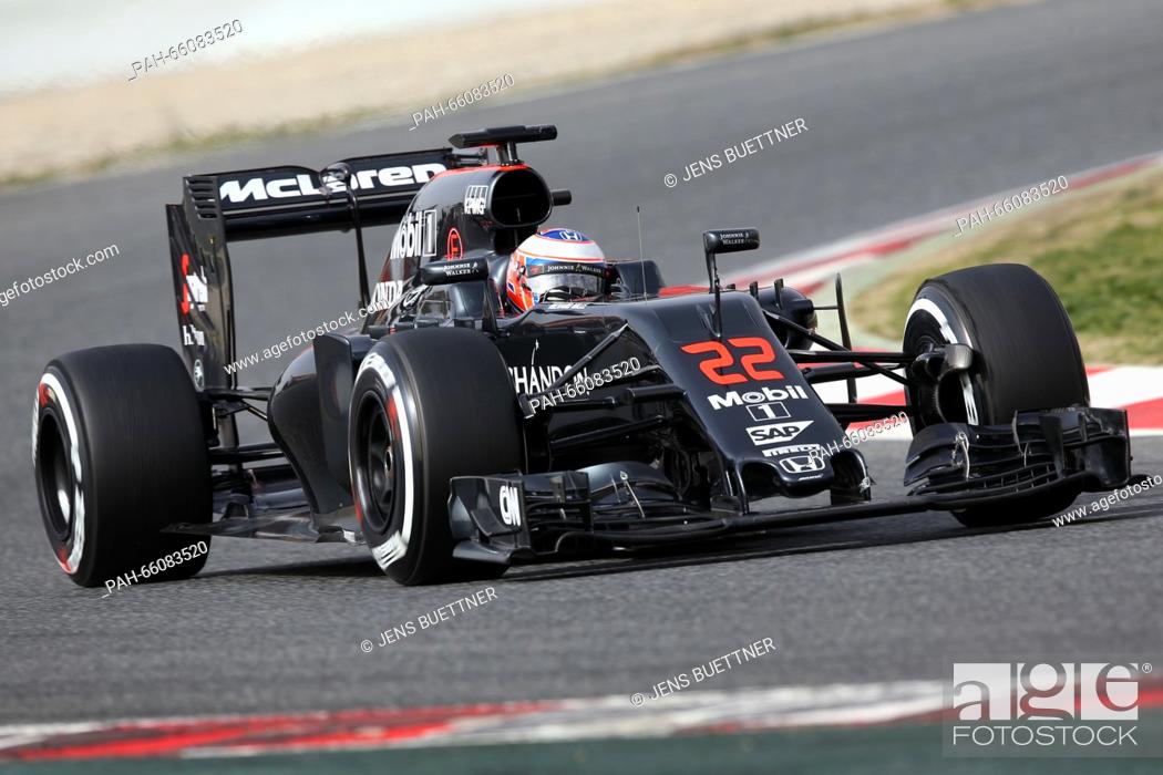 Stock Photo: British Formula One driver Jenson Button of McLaren Honda steers the new car MP4-31 during a training session for the upcoming Formula One season at the Circuit.