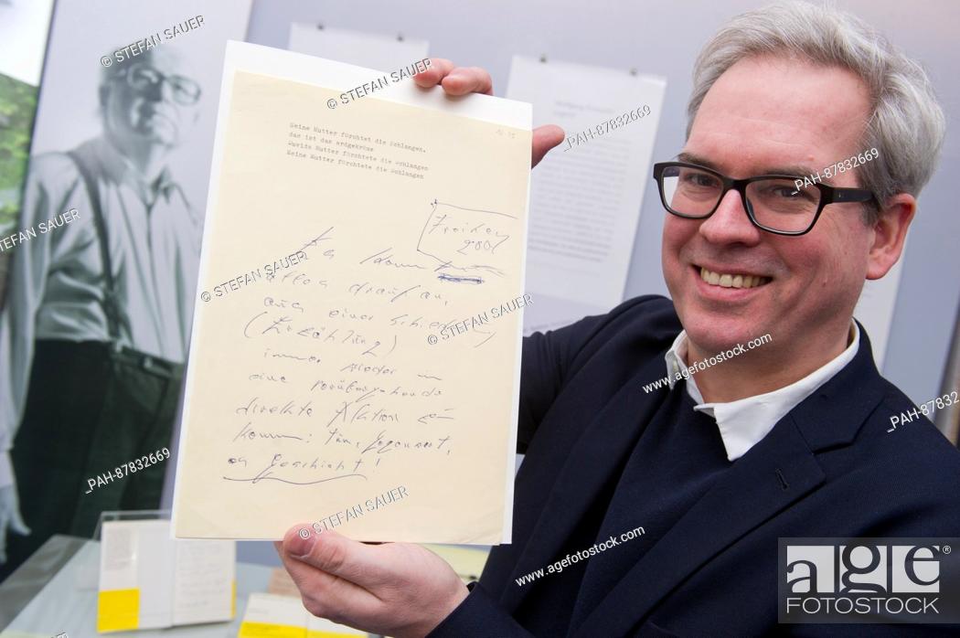 Stock Photo: Eckhard Schumacher, Professor for Modern German Literature and Koeppen researcher, holds up a typescript of Koeppen in Greifswald, Germany, 18 January 2017.