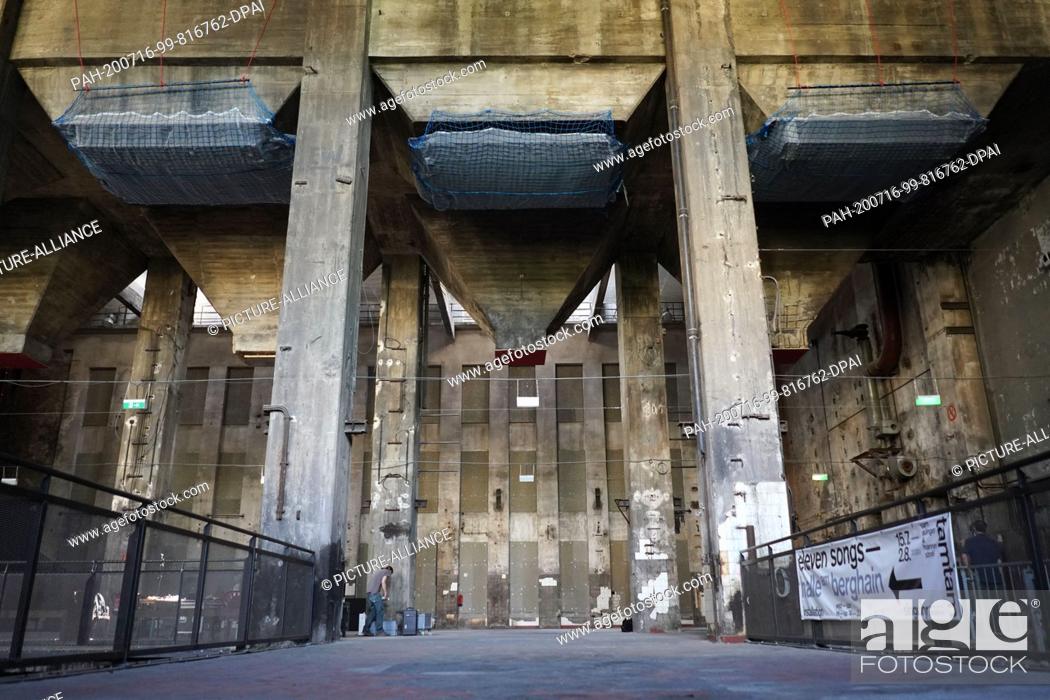 Stock Photo: 14 July 2020, Berlin: View into the former combined heat and power plant of Friedrichshain, where the installation sound installation ""Eleven Songs"" can be.