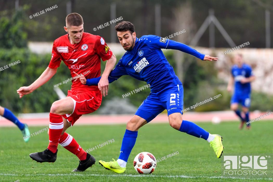 Stock Photo: Burak Camoglu (KSC) in the duels with Marin Cavar (FC Winterthur). GES / Football / 3rd League: Test match in training camp: Karlsruher SC - FC Winterthur, 15.
