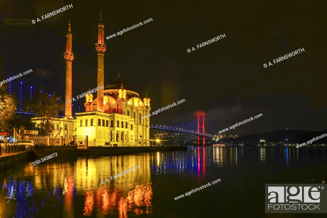 Stock Photo: Istanbul, Turkey The Ortakoy Mosque under the Bosphorus Bridge, known officially as the 15 July Martyrs Bridge and unofficially as the First Bridge.