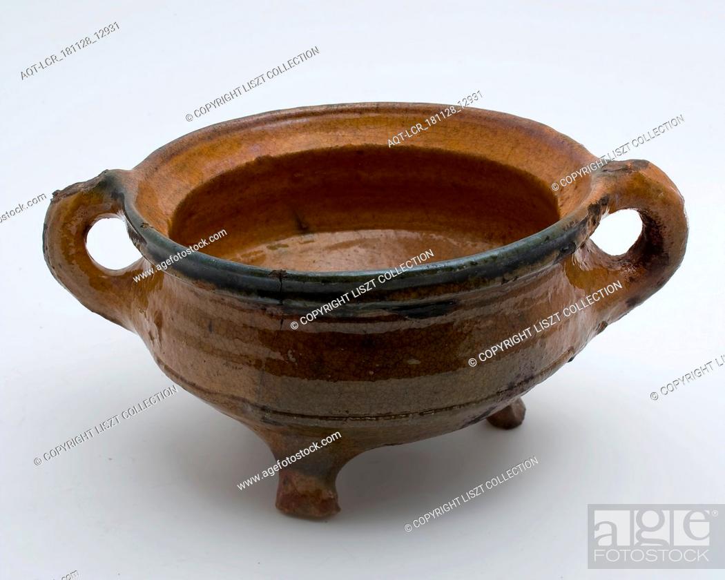 Stock Photo: Pottery cooking pot, red shard, lead glaze with greenish spots, two sausages, on three legs, cooking pot crockery holder kitchenware earth discovery ceramics.