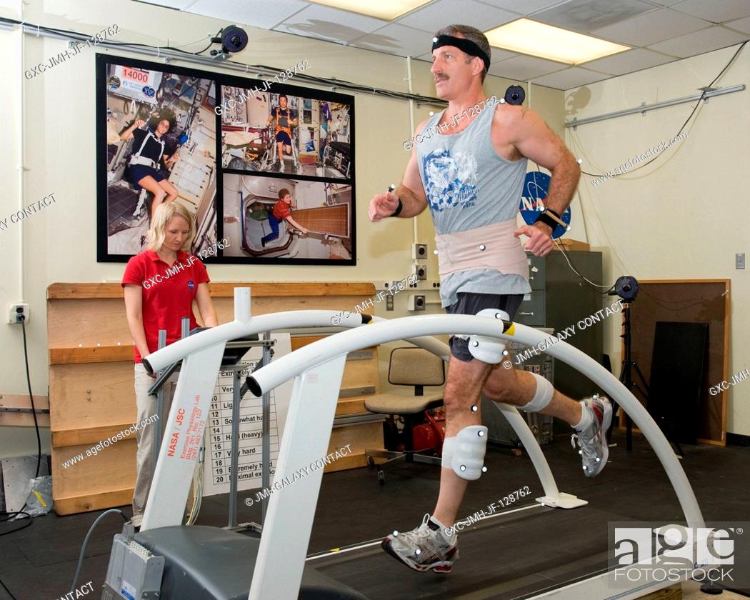 Stock Photo: NASA astronaut Dan Burbank, Expedition 29 flight engineer and Expedition 30 commander, participates in a treadmill kinematics baseline data collection session.