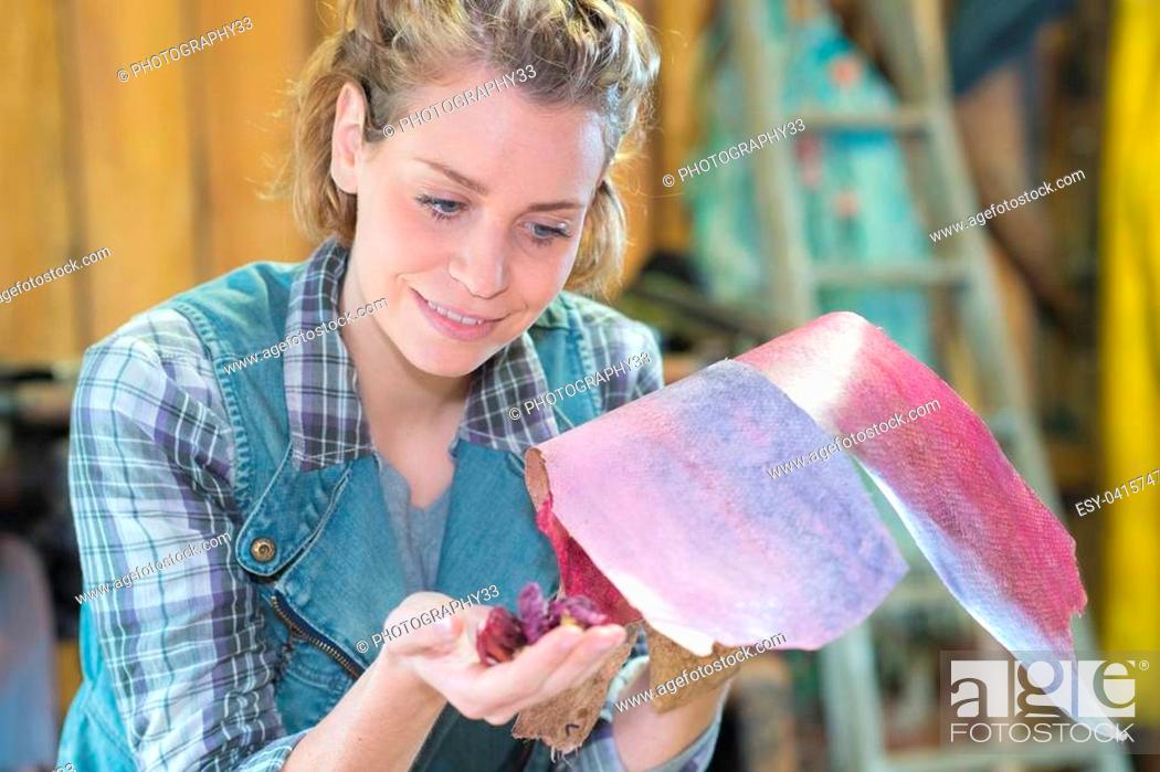 Stock Photo: confident female carpenter in workshop.