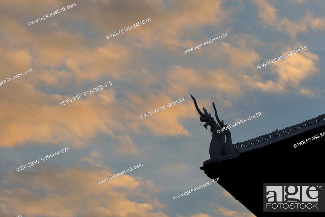 Stock Photo: The silhouetted roof of Wat Wisunalat which is the oldest temple in the UNESCO world heritage town of Luang Prabang in Central Laos.