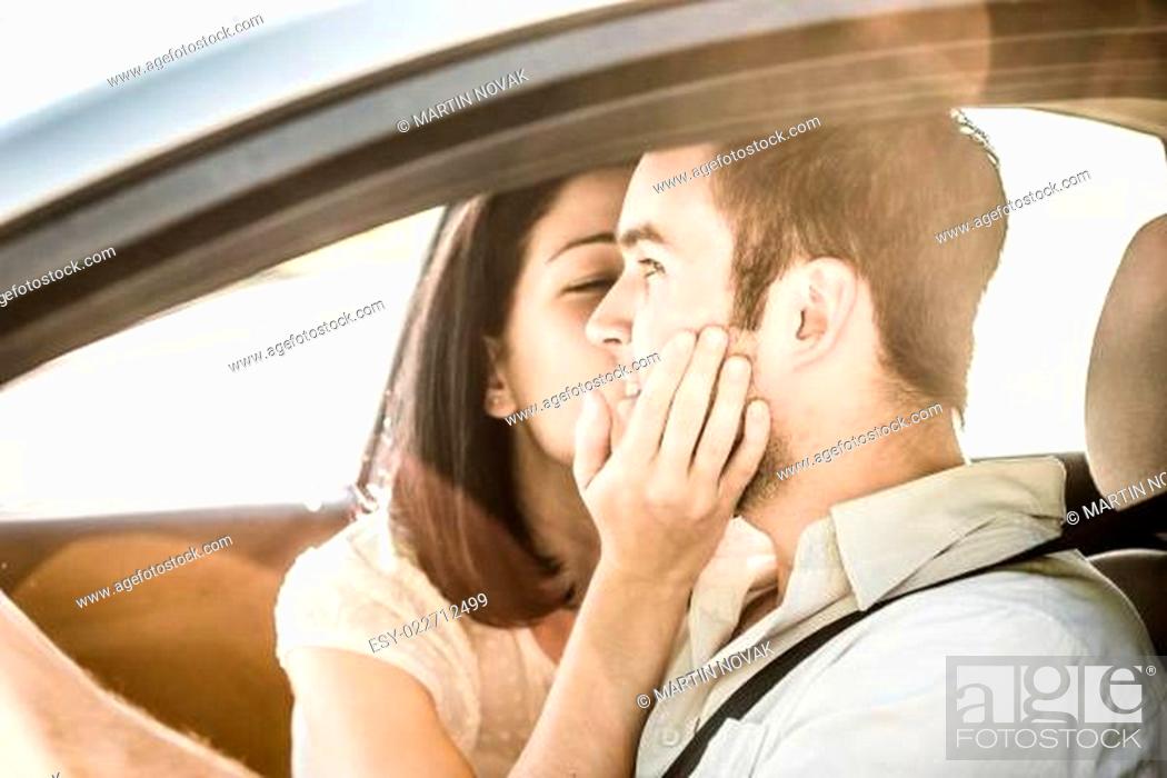 Stock Photo: Big kiss in car.