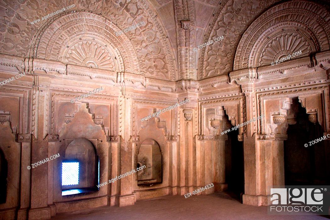 Stock Photo: View of fine carving on arches and upper wall of hall at Gwalior Fort in Gwalior, Madhya Pradesh, India, Asia.