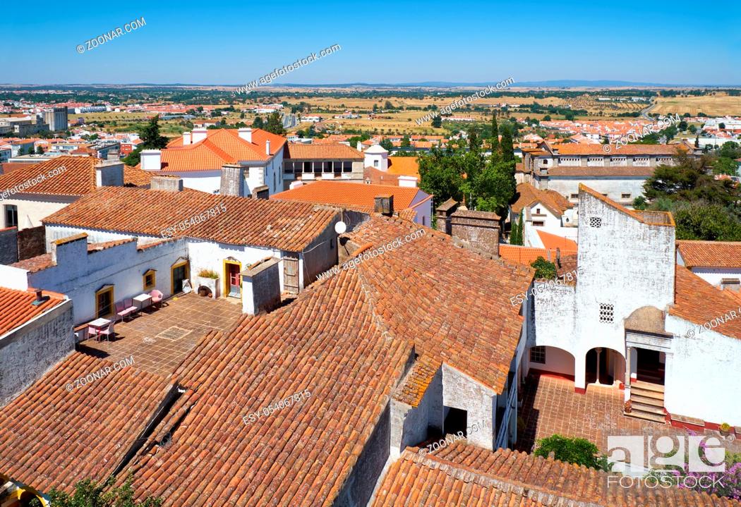 Stock Photo: The view on the city residential houses surrounding the Cathedral (Se) of Evora from the roof of the church. Portugal.