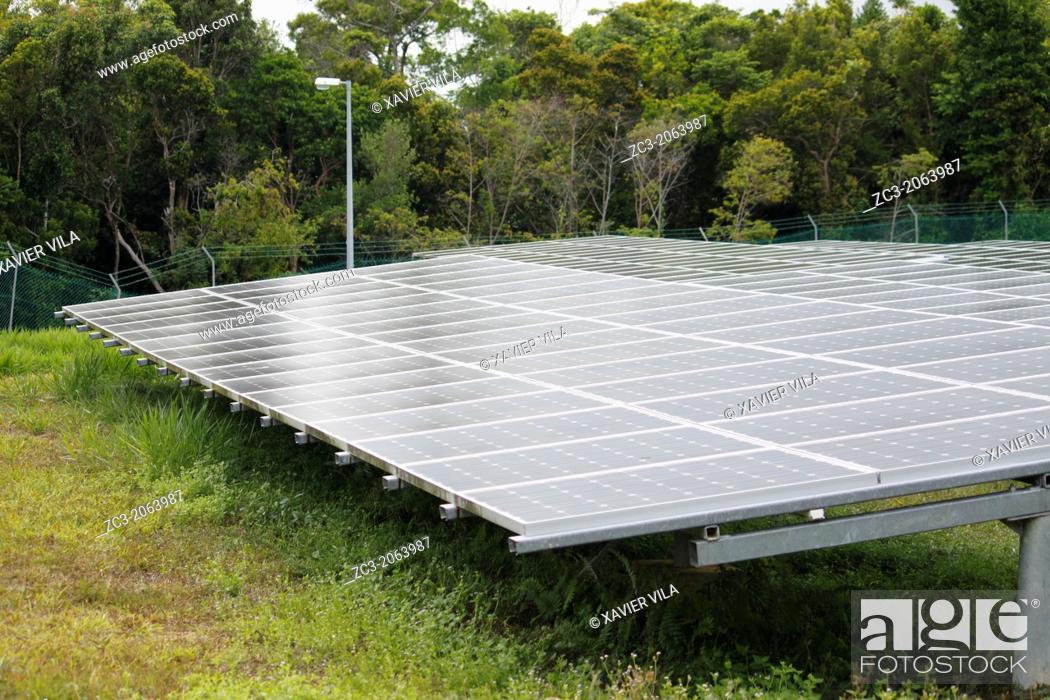 Stock Photo: Solar panels in the tropical jungle on the island of Pulau Perhentian Kecil, near Long Beach, China Sea, Terengganu, Malaysia.