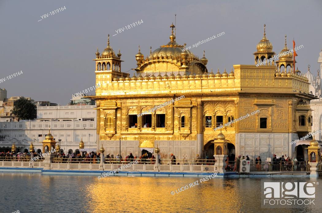 Stock Photo: India. Punjab. Amritsar. The Golden Temple. The Sri Harmandir Sahib the holy of holies of Sikhism, hindu-islamic style.