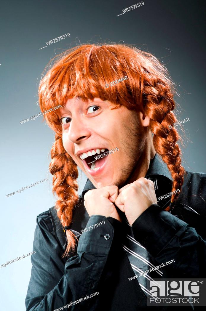 Funny man with red hair wig, Stock Photo, Picture And Royalty Free Image.  Pic. WR2579319 | agefotostock