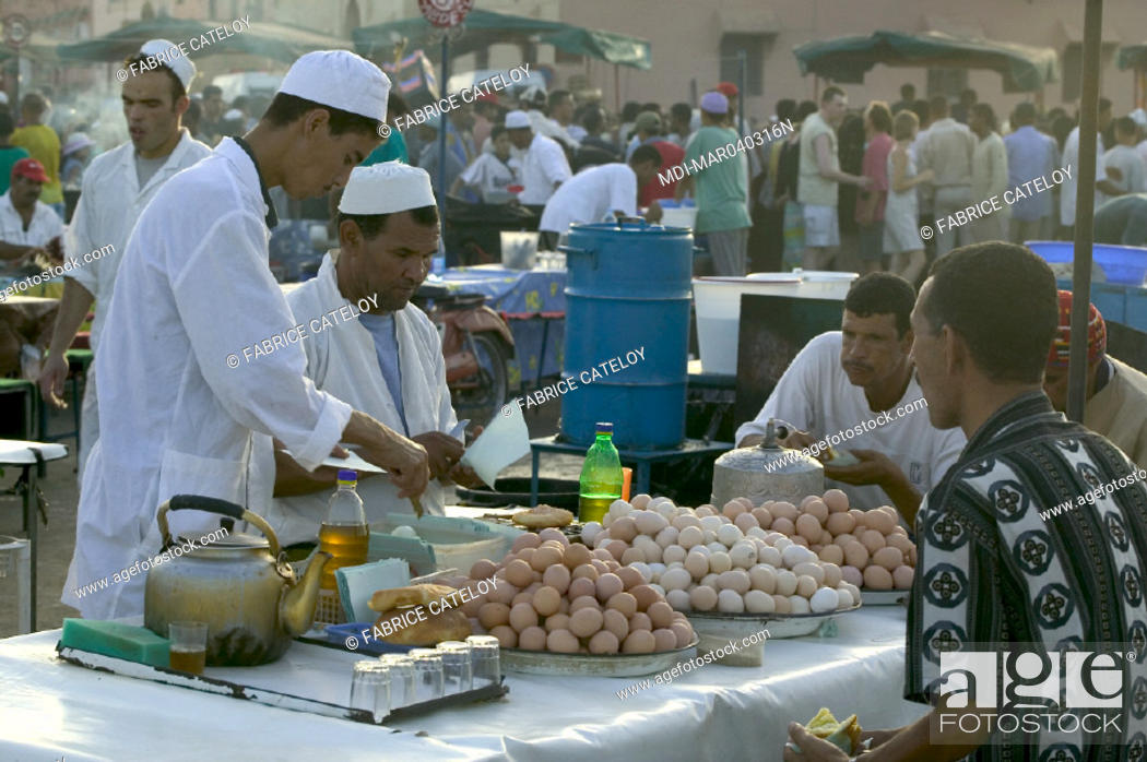 Stock Photo: Jemaa El Fna place - Shopkeeper cooking eggs.