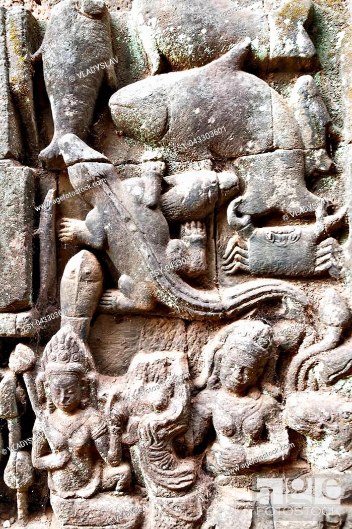Stock Photo: Detail of carvings background Bas-Relief Statue of Khmer Culture in Angkor Wat, Cambodia.